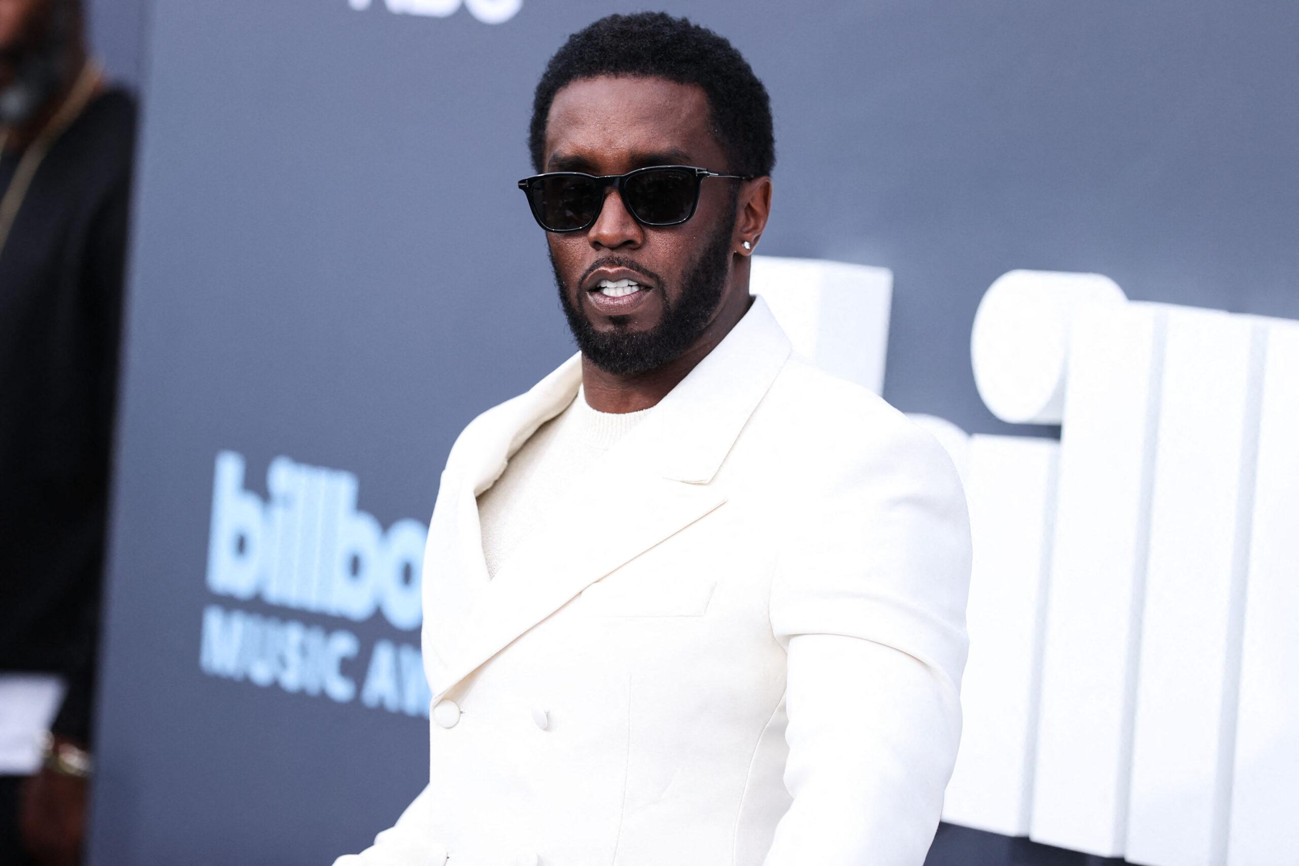 Diddy in white suit