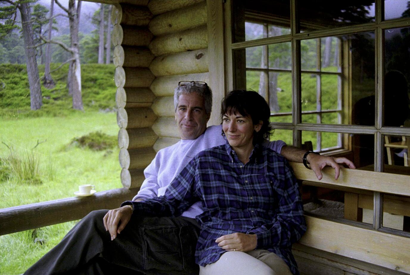 Pictured: Ghislaine Maxwell&nbsp;and&nbsp;Jeffrey Epstein relax at Queens Balmoral log cabin in newly-released photo