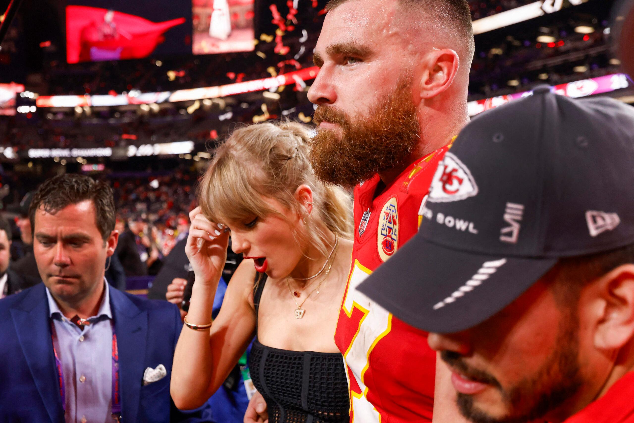 Taylor Swift embraces beau Travis Kelce after the Kansas City Chiefs win the super bowl beating the San Francisco 49ers 25-22.
