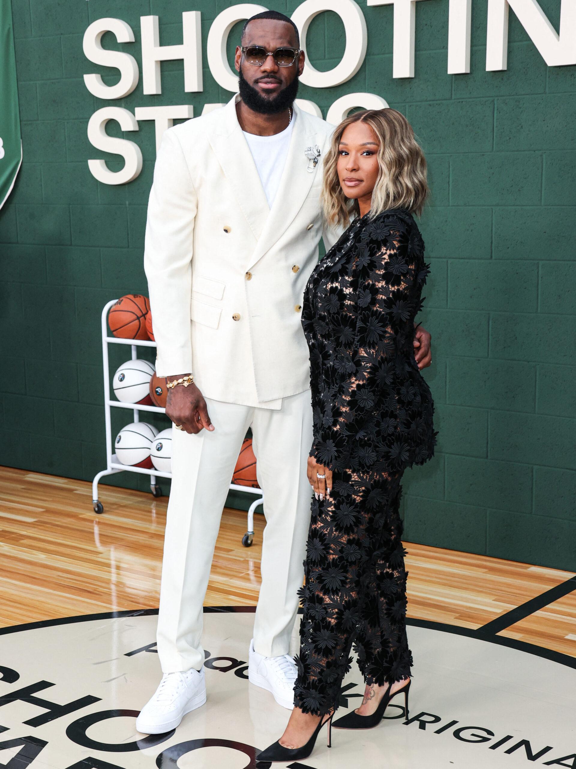 LeBron and Savannah James posing on the red carpet.