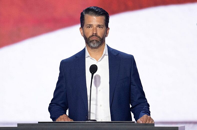 Donald Trump Jr. participates in a microphone check prior to Day 2 of the 2024 Republican National Convention