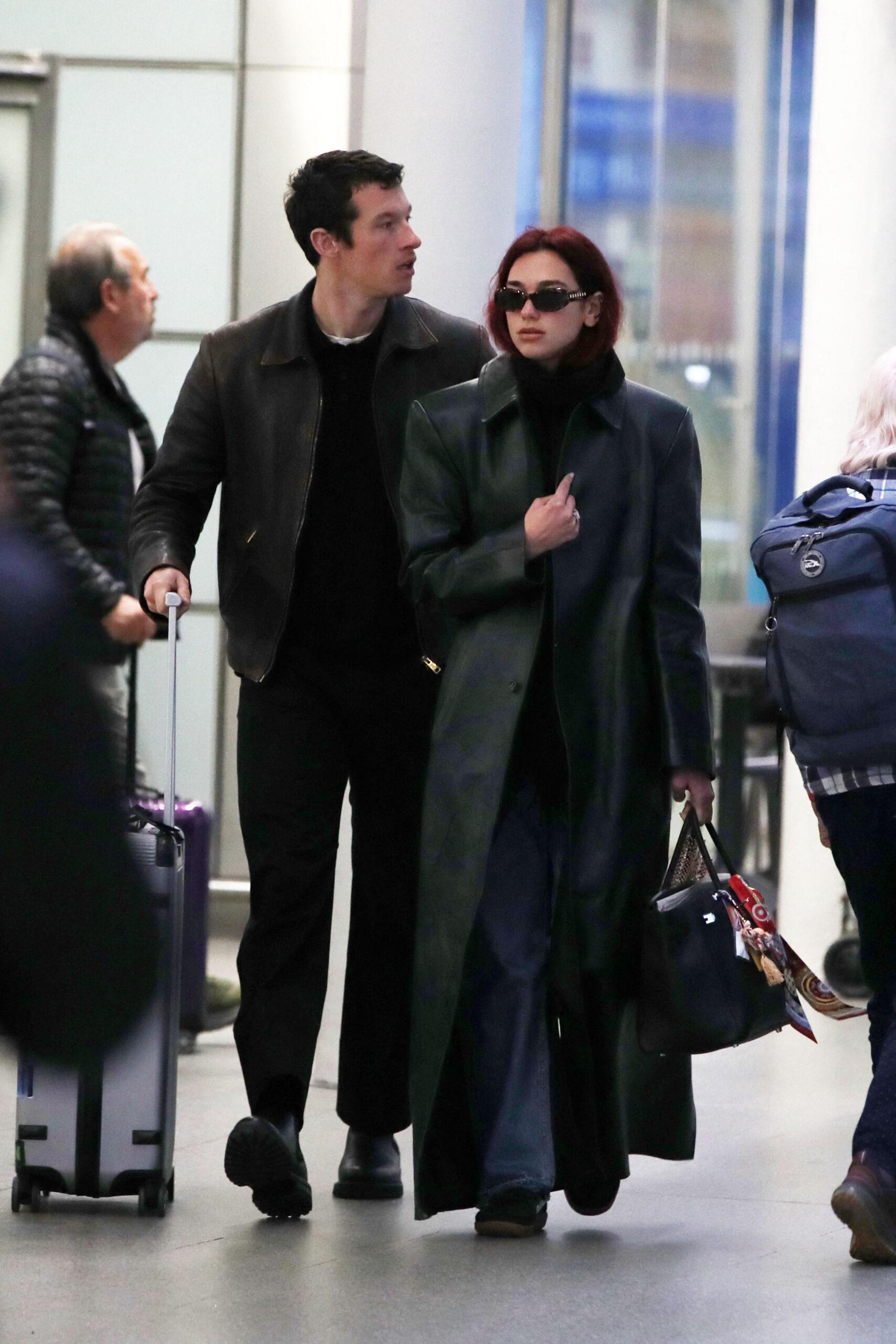 Dua Lipa and Callum Turner arriving back in the UK from Paris.